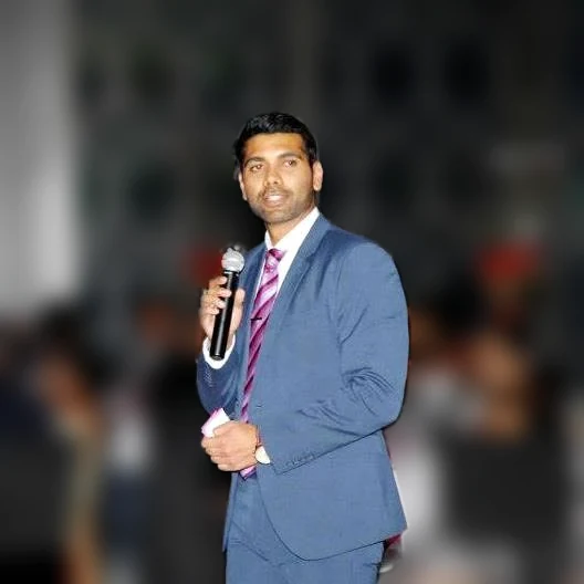 Arun K Meena, founding member of the Amer Chamber of Commerce, speaking at an event